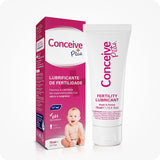 For Conceive Plus Fertility Lubricant Tube + Applicators (PT), product image showing a 75ml fertility lubricant tube standing upright next to its pink retail box labeled in Portuguese, with a baby illustration at bottom and icons highlighting calcium, magnesium, and pH balance, all set against a clean white background.