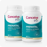 Two bottles of Conceive Plus Prenatal Essential Nutrients supplements, each containing 60 vegan capsules, formulated with folate, choline, and DHA to support maternal health.